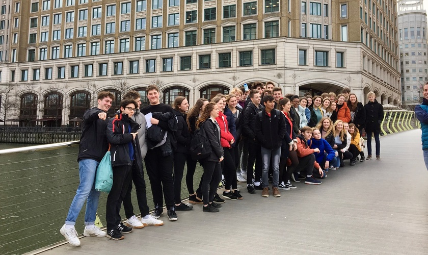 Students standing on a London bridge
